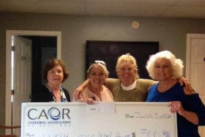 Cherokee Association of REALTORS® Give Back to the Community With a Donation to The North Georgia Angel House