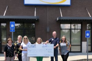 Cherokee Association of REALTORS® Give Back to the Community With a Donation to MUST Ministries, Inc.